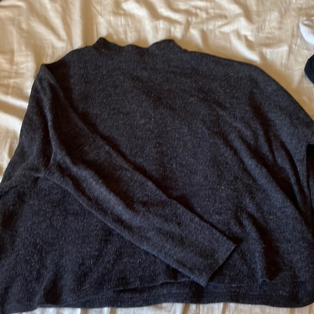 divided dark grey sweater